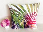 Funda de cojín hojas tropicales multicolor con diseño botánico sobre fondo claro